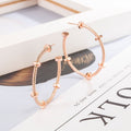 Simple And Elegant Round Studs Ring Spiral Texture Earrings - Norellé