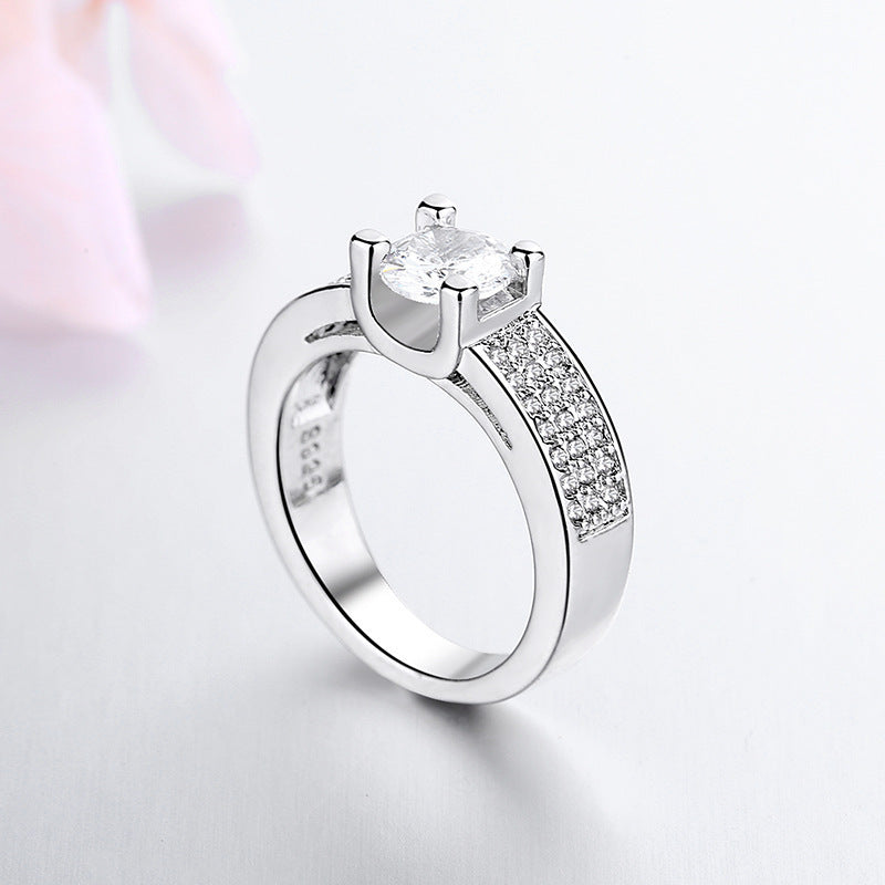 High-grade Plated 18K Four-claw Ring - Norellé