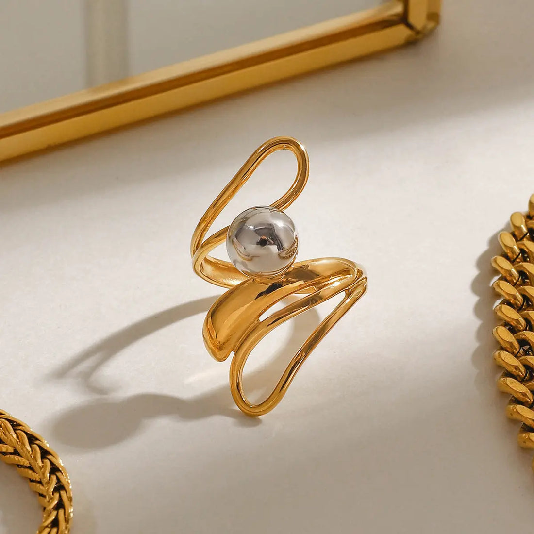 Color Matching Irregular Hollow-out Light Luxury French Steel Ball Open Ring - Norellé
