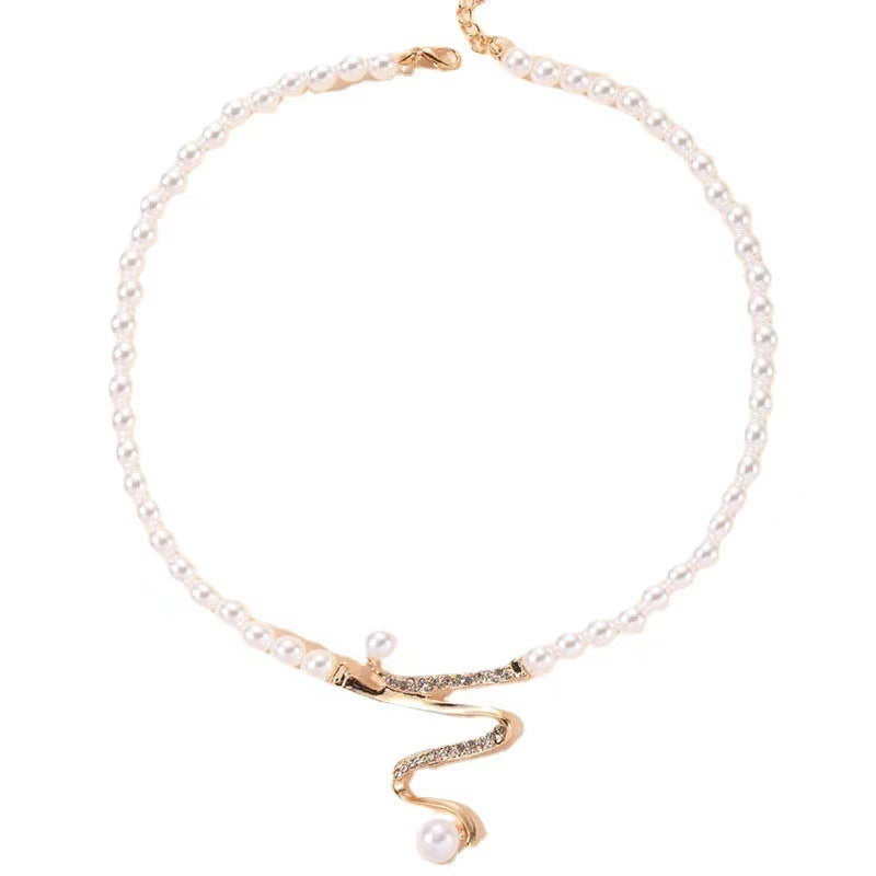 Fashion Personality Deep V Clavicle Pearl Pendant Suit - Norellé