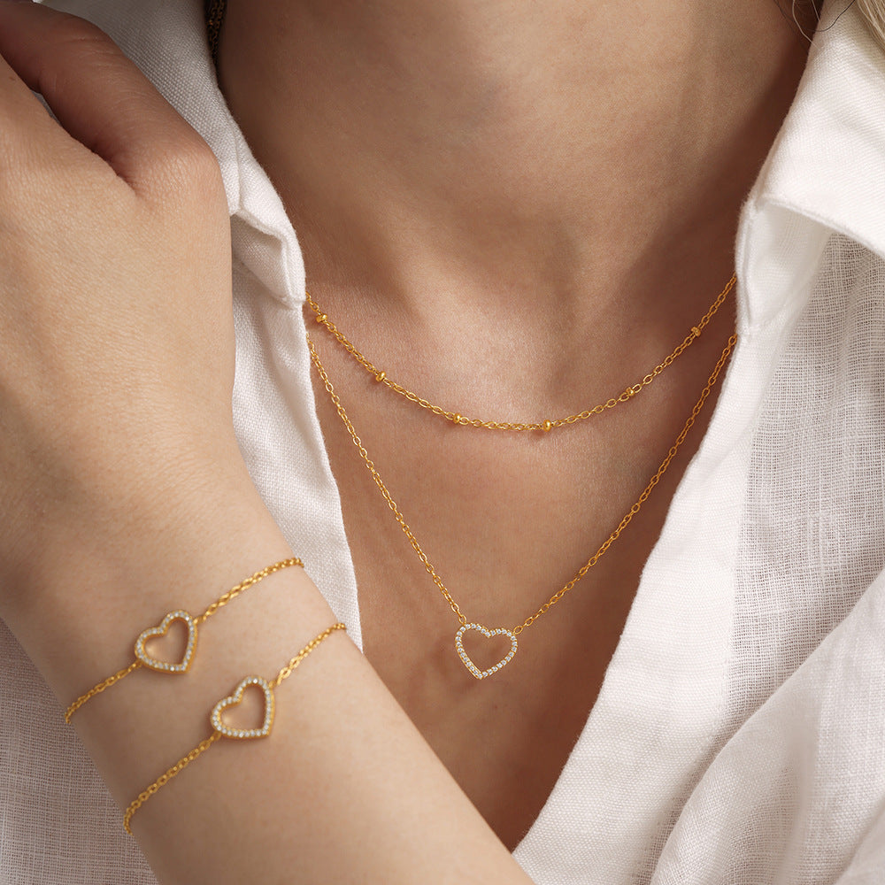Stainless Steel Fully Jeweled Loving Heart Zircon Non-fading Texture Bracelet For Women - Norellé