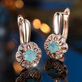 Round BW1 Diamond Edge White Diamond Hollow Flower Ear Clips - Norellé