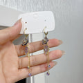 New Purple Delicate Flower Leaf Tassel Earrings - Norellé