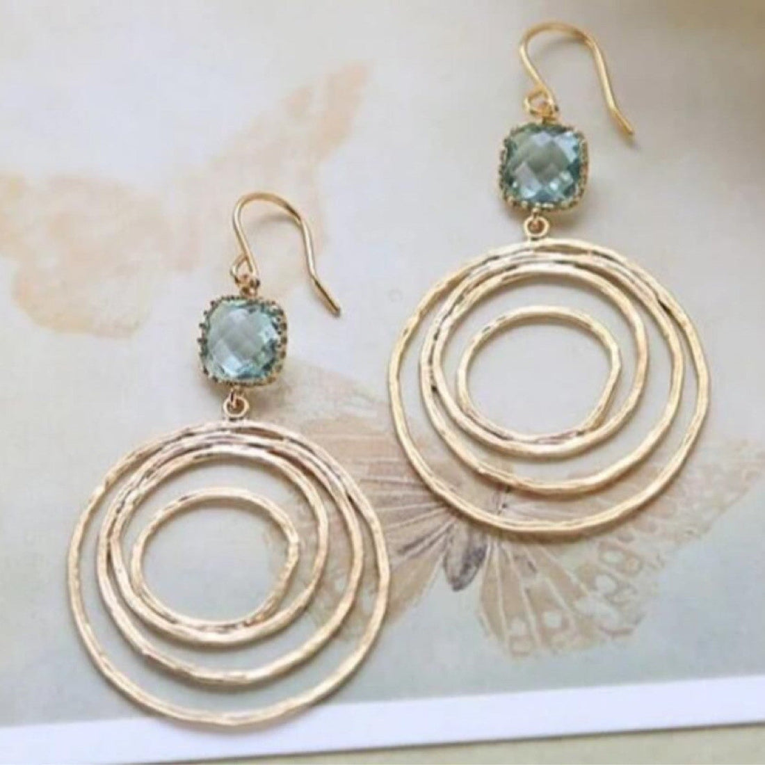 Fashion Creative Hollow Round Vortex Inlaid Sapphire Earrings - Norellé