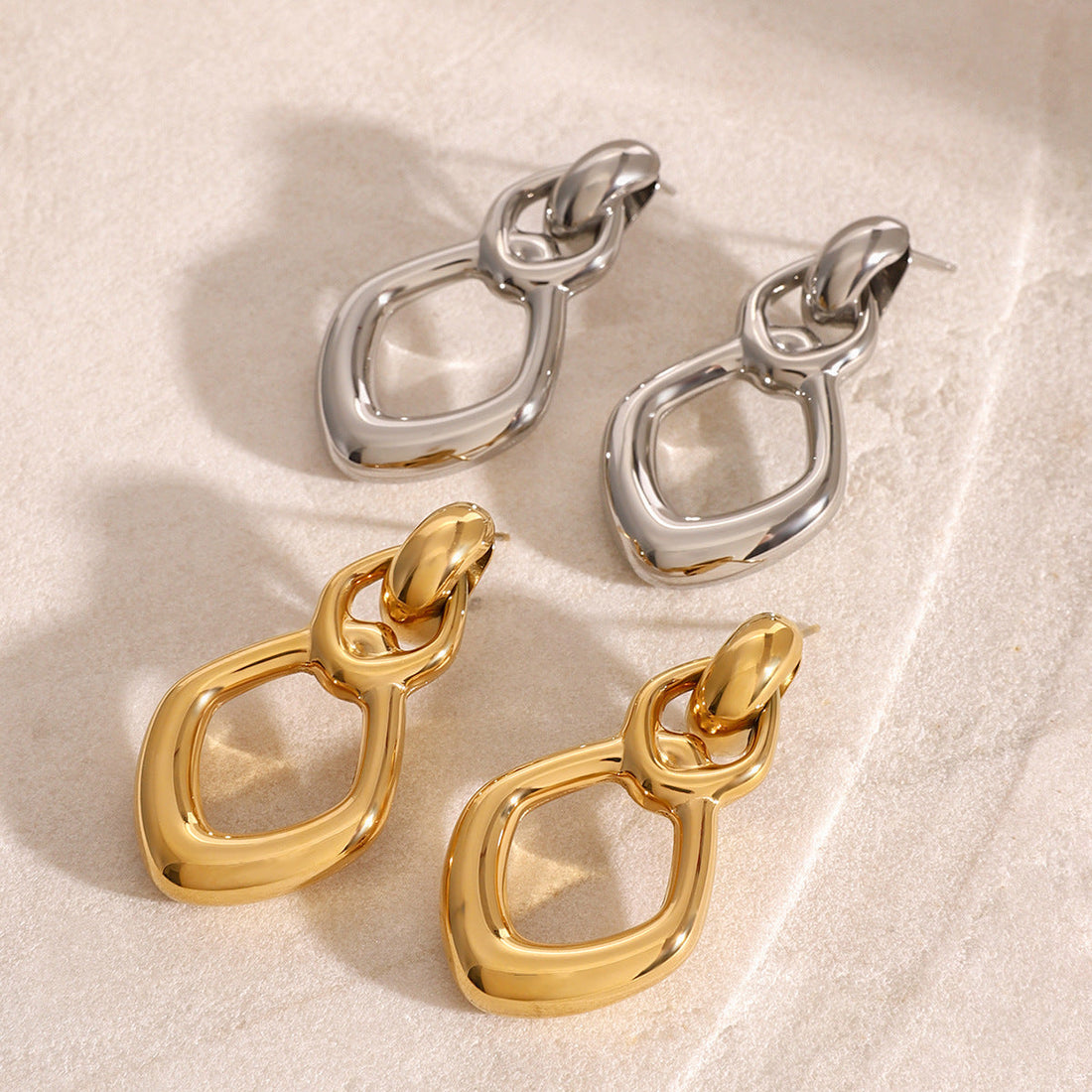 Stainless Steel Hollow Stud Earrings Advanced Geometry - Norellé