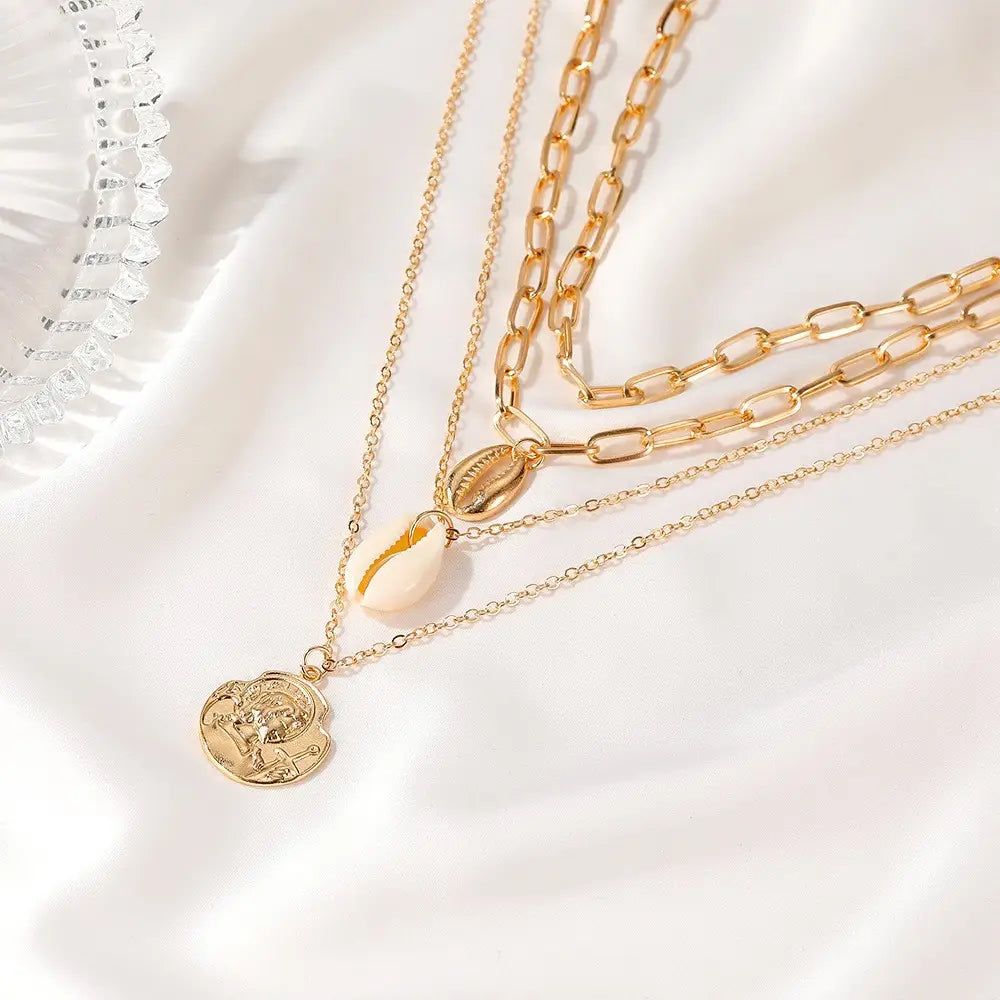 Women’s All-match Simple Shell Pendant Hollow Portrait Multi-layer Necklace