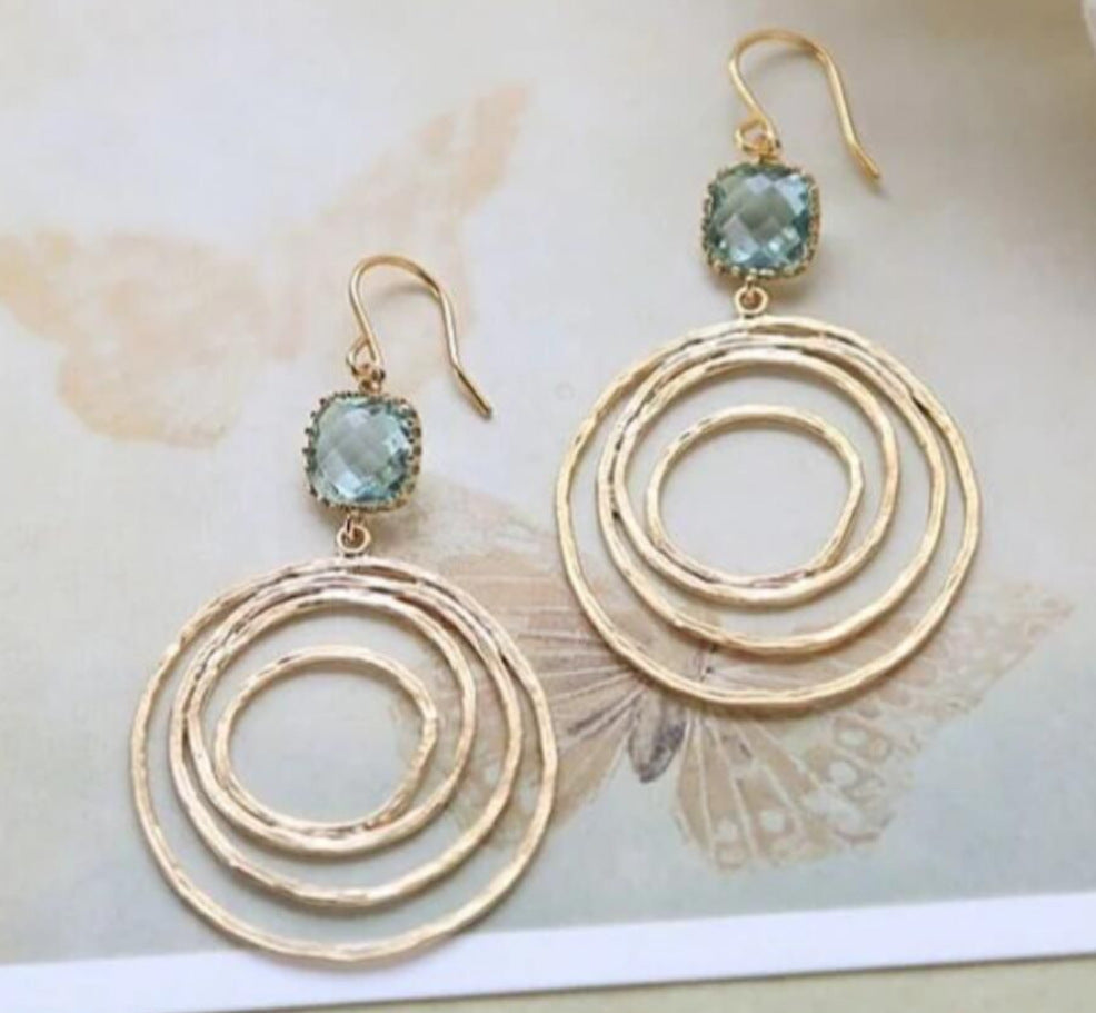Fashion Creative Hollow Round Vortex Inlaid Sapphire Earrings - Norellé