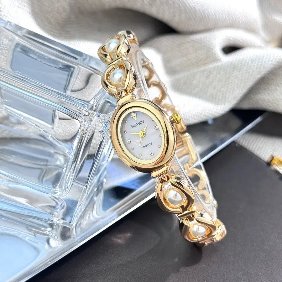 Ladies’ Oval Sun Print Rhinestone Dial Elegant Lady Quartz Watch