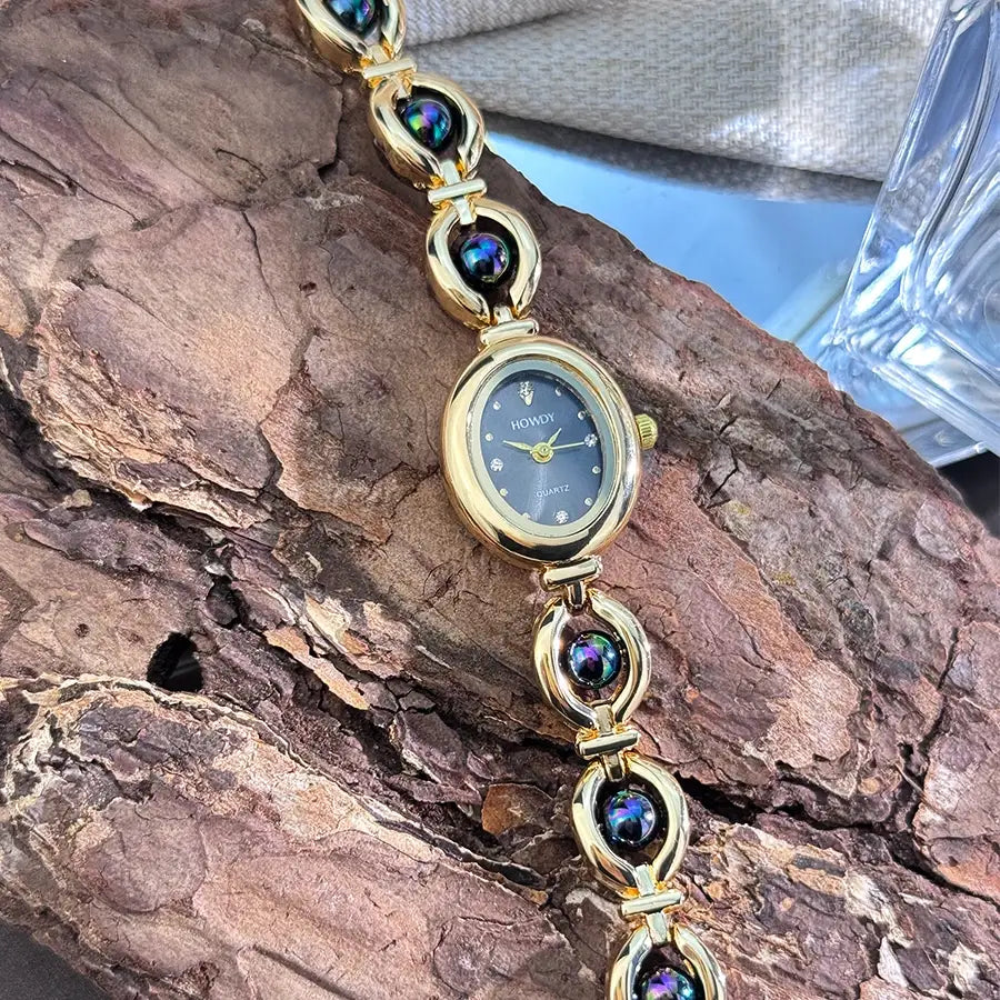 Ladies’ Oval Sun Print Rhinestone Dial Elegant Lady Quartz Watch