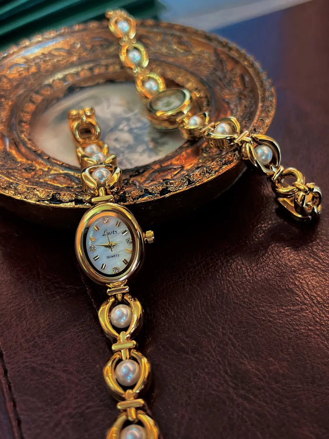 Elegant Ladies’ Pearl Strap Waterproof Oval Quartz Wristwatch