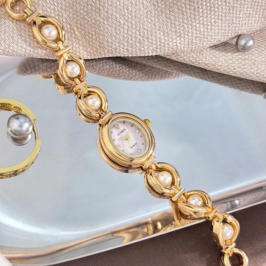 Ladies’ Oval Sun Print Rhinestone Dial Elegant Lady Quartz Watch