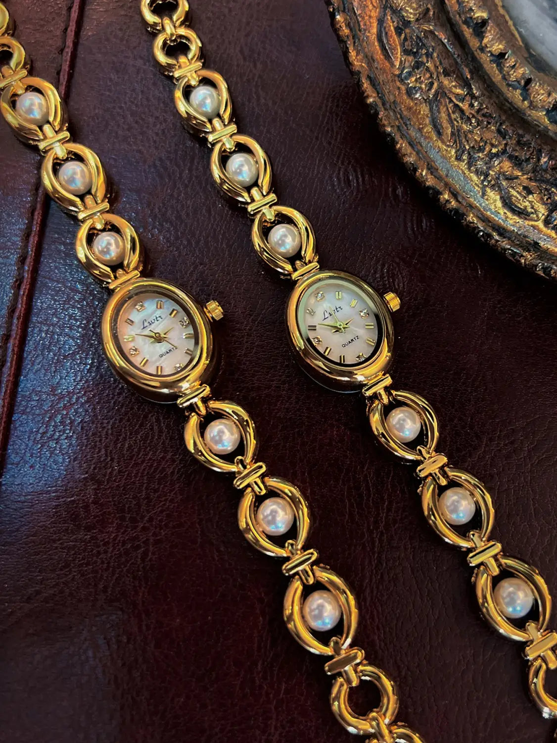 Elegant Ladies’ Pearl Strap Waterproof Oval Quartz Wristwatch