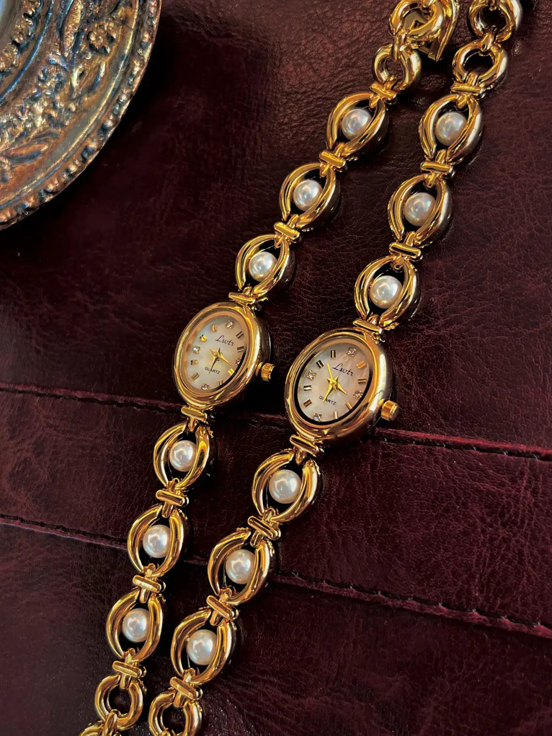 Elegant Ladies’ Pearl Strap Waterproof Oval Quartz Wristwatch