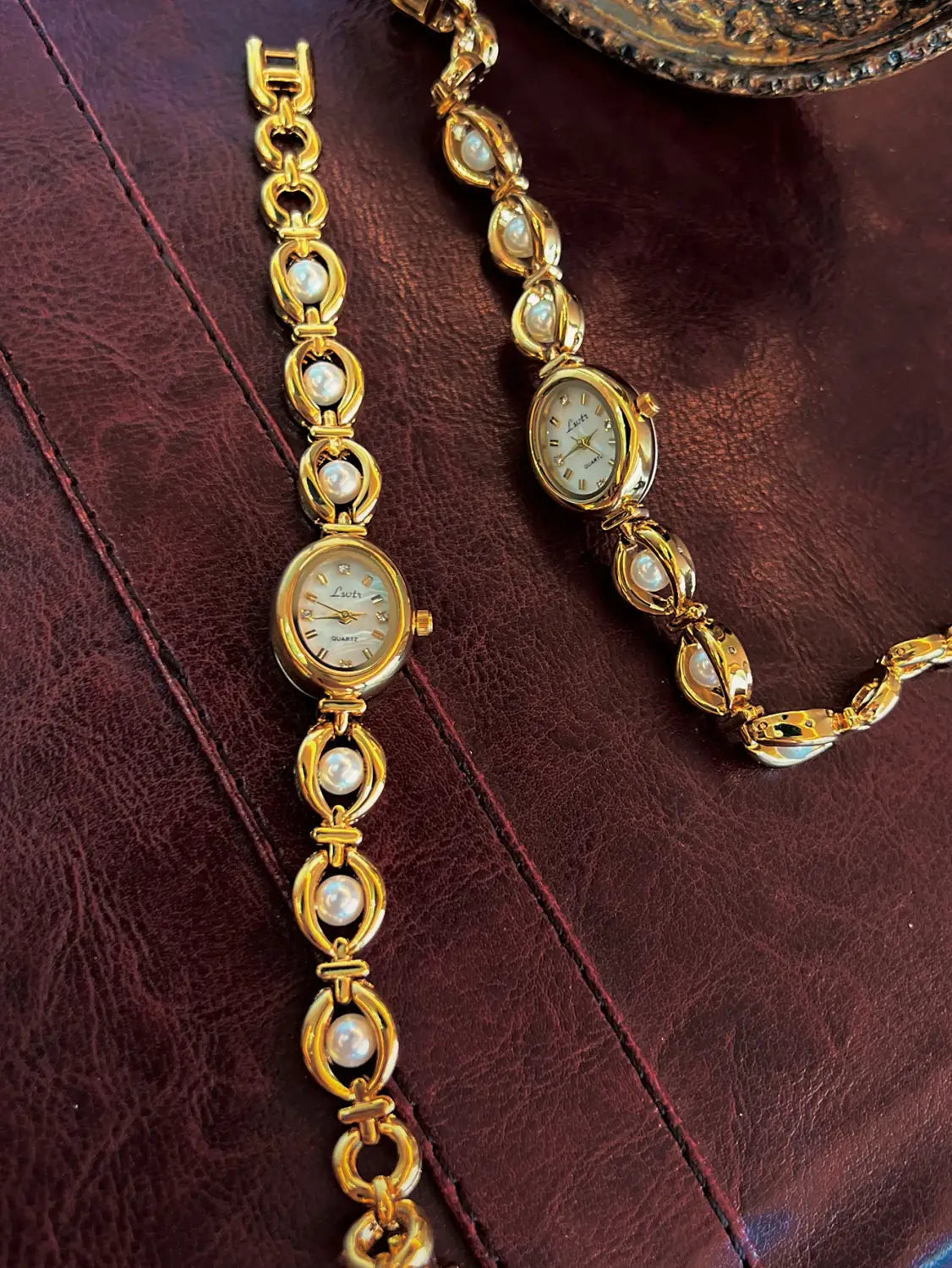 Elegant Ladies’ Pearl Strap Waterproof Oval Quartz Wristwatch