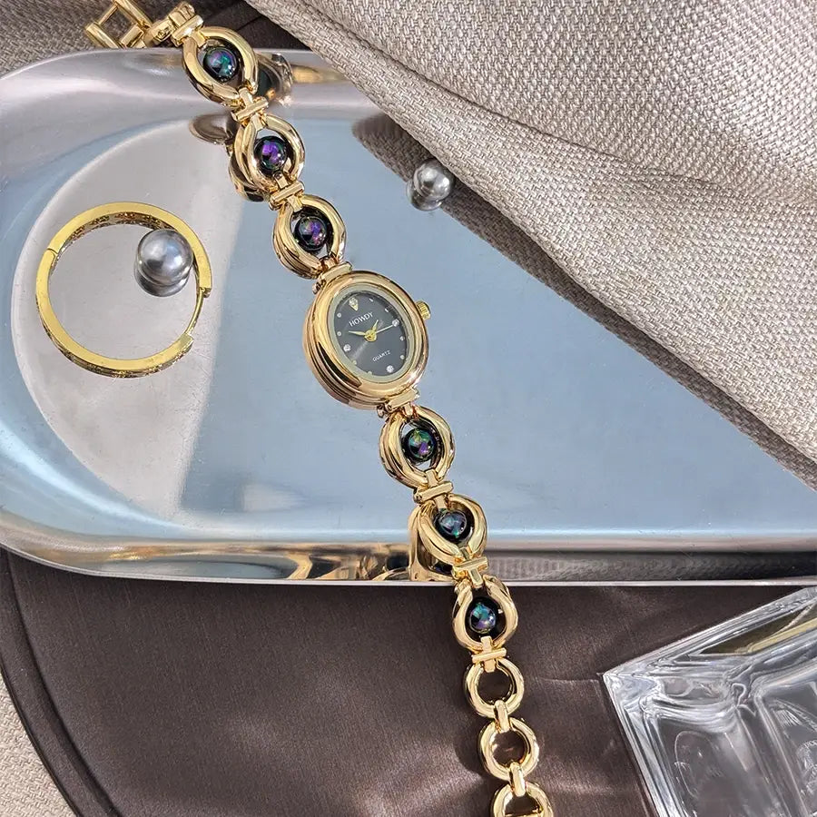 Ladies’ Oval Sun Print Rhinestone Dial Elegant Lady Quartz Watch