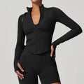 Black athletic zip-up jacket with thumbholes and matching biker shorts, long sleeved sports set