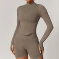 Taupe ribbed long sleeved sports jacket with standing collar long and matching biker shorts