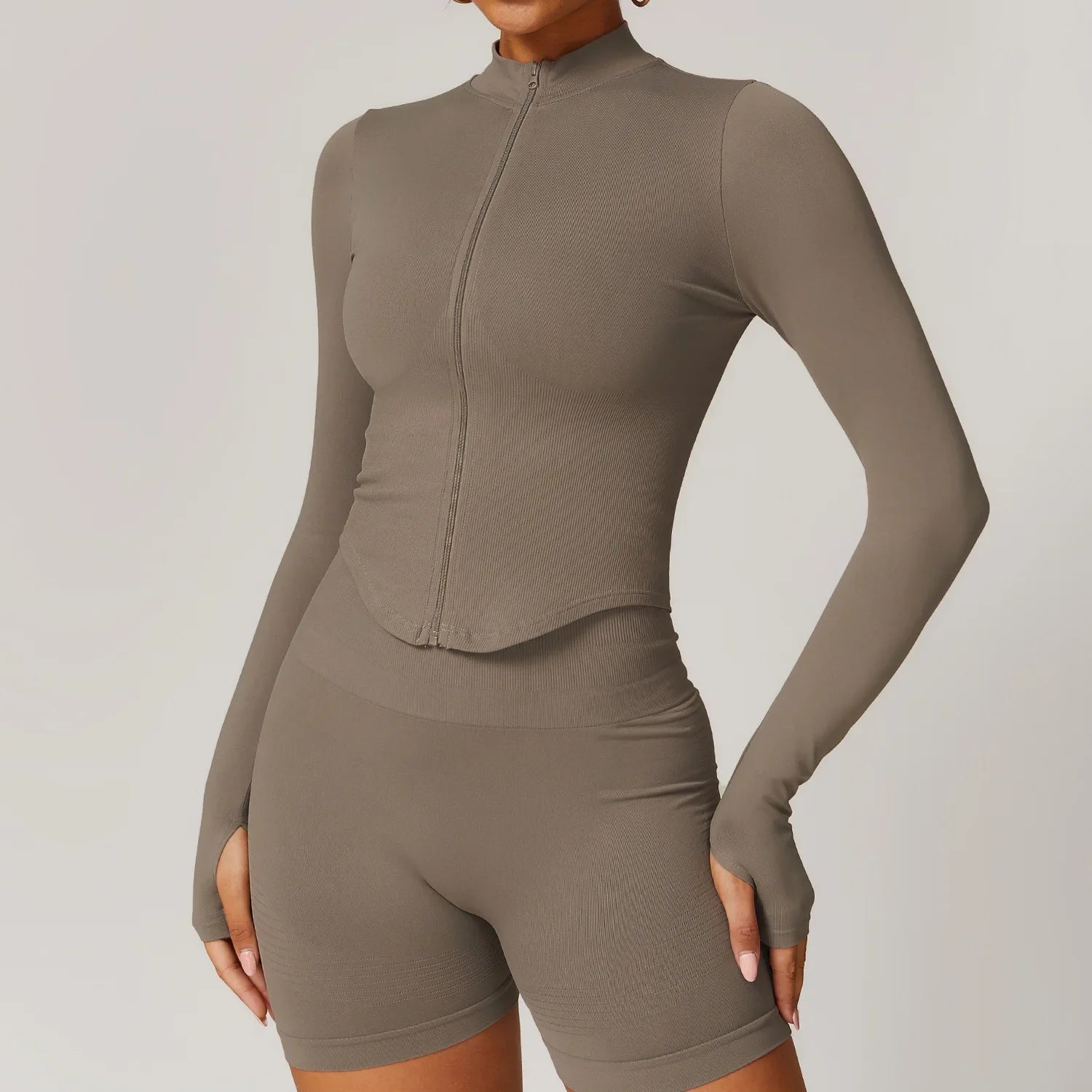 Taupe ribbed long sleeved sports jacket with standing collar long and matching biker shorts