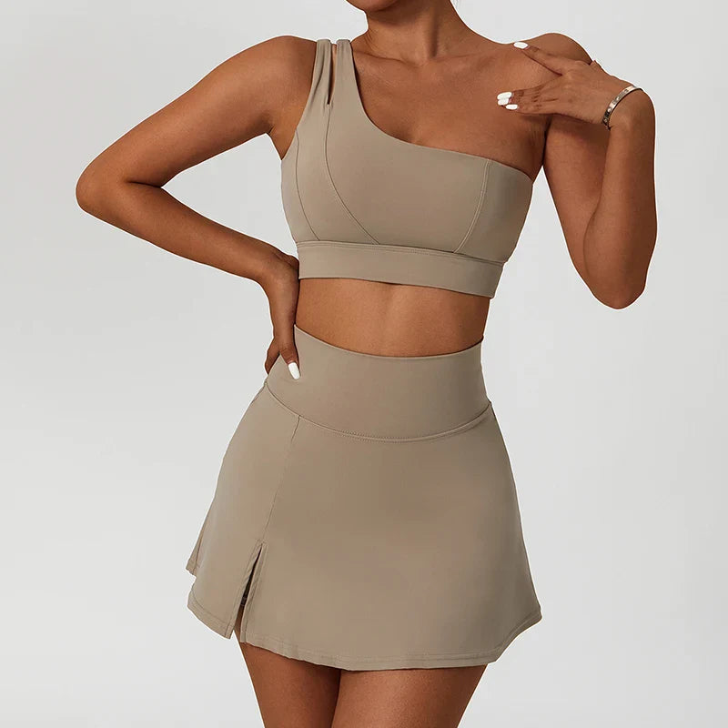Women’s one-shoulder sports bra and pleated mini skirt set in neutral taupe tennis suit women piece tennis suit women sport