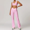 Pink athletic top and flared leggings set with white trim for workout outfits fitness