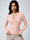 Brown cropped athletic jacket in light pink with full front zipper
