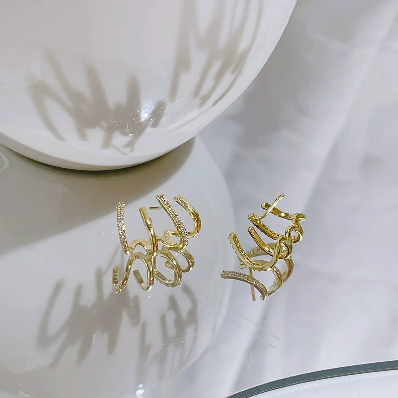 Women's Niche Design Internet Celebrity Fashion Four-claw Earrings Birthday Gift - Norellé