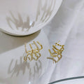 Women's Niche Design Internet Celebrity Fashion Four-claw Earrings Birthday Gift - Norellé