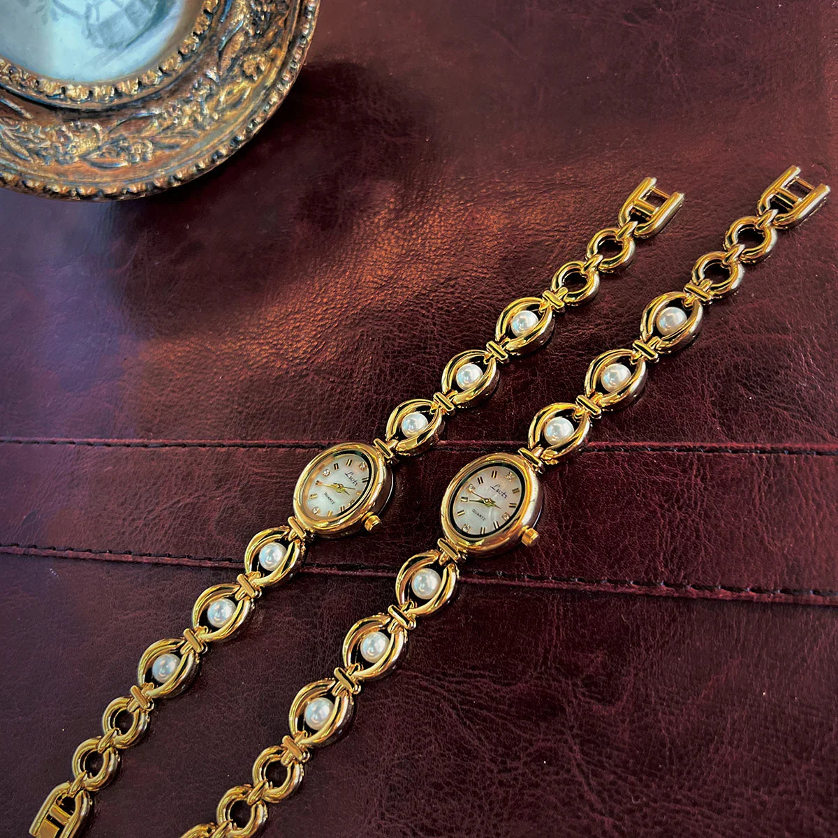 Elegant Ladies’ Pearl Strap Waterproof Oval Quartz Wristwatch - Gold