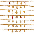Multiple rows of gold charm bracelets with cubic zircon geometric pendants and charms