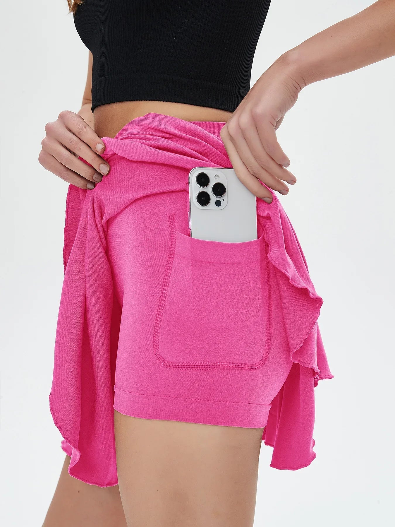 Pink high waisted tennis mini skirt with side phone pocket