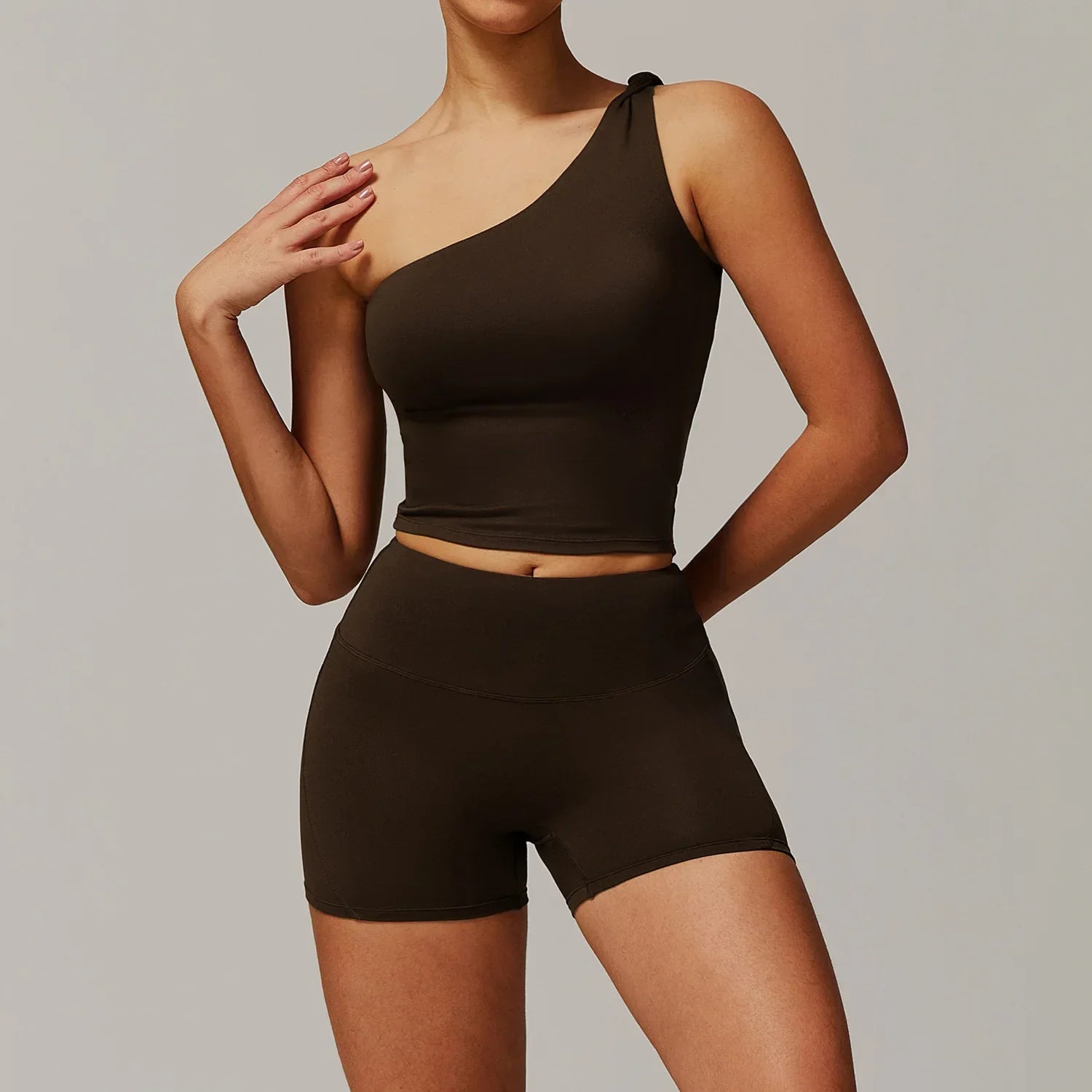 Light blue 2pcs yoga set with one-shoulder crop top and flared pants for women gym clothing