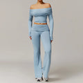 Light blue 2pcs yoga set with one-shoulder crop top and flared pants for women gym clothing