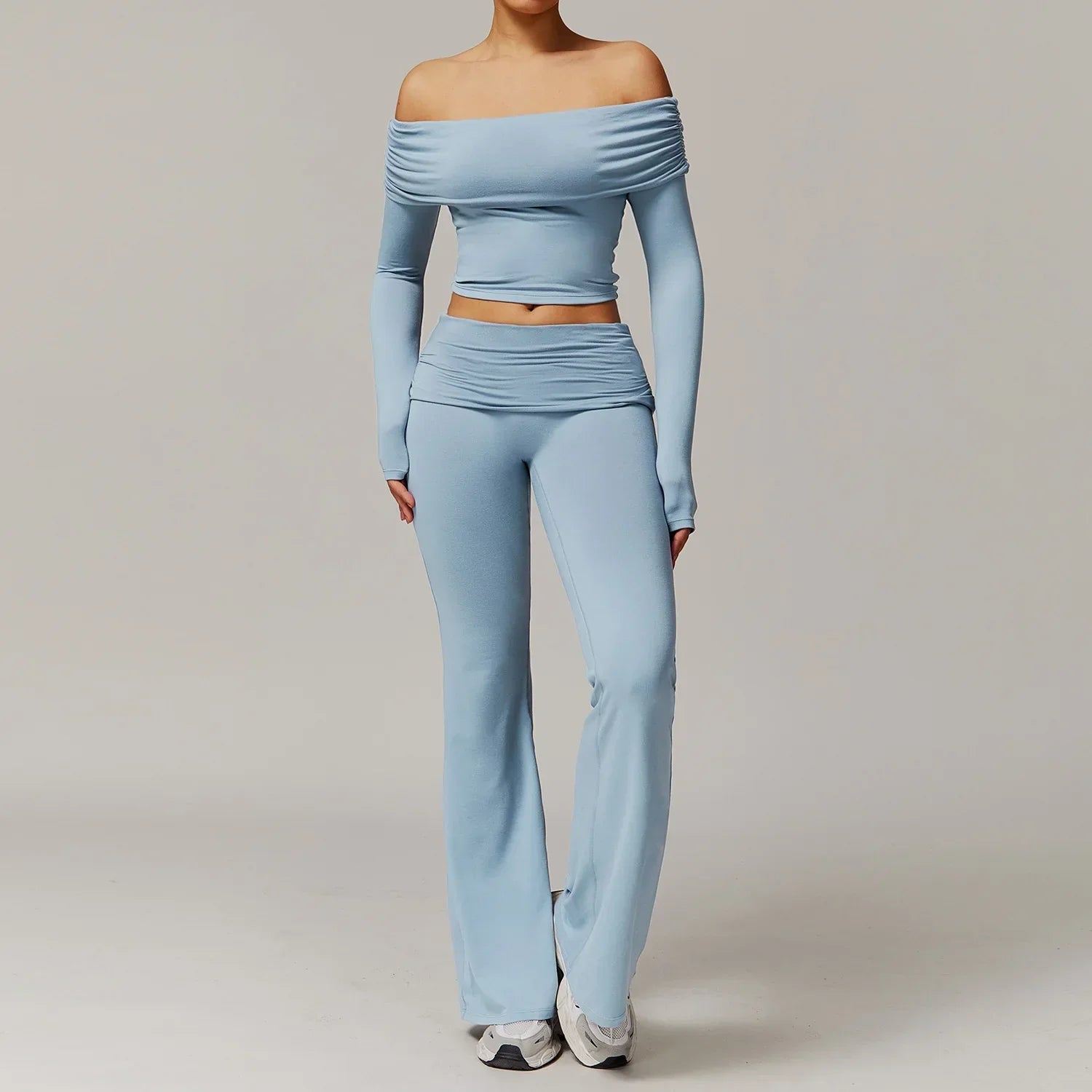 Light blue 2pcs yoga set with one-shoulder crop top and flared pants for women gym clothing