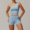 Light blue 2pcs yoga set with one-shoulder crop top and shorts for women gym clothing