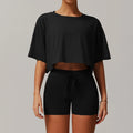Black short-sleeved crop top and matching shorts set, ideal for women tracksuit yoga and sportswear 2pcs women