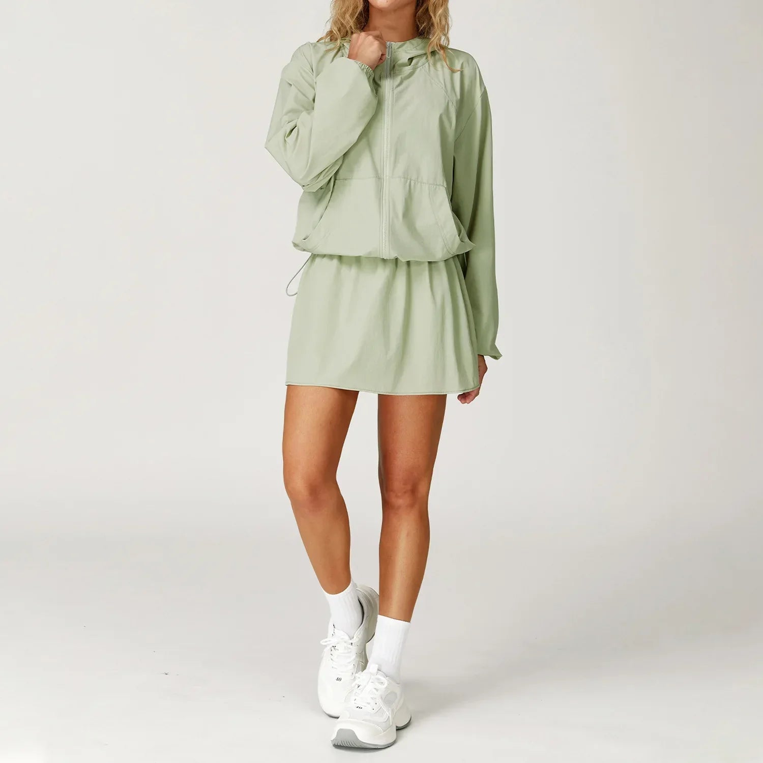 Light green hooded windbreaker dress with cinched waist for women