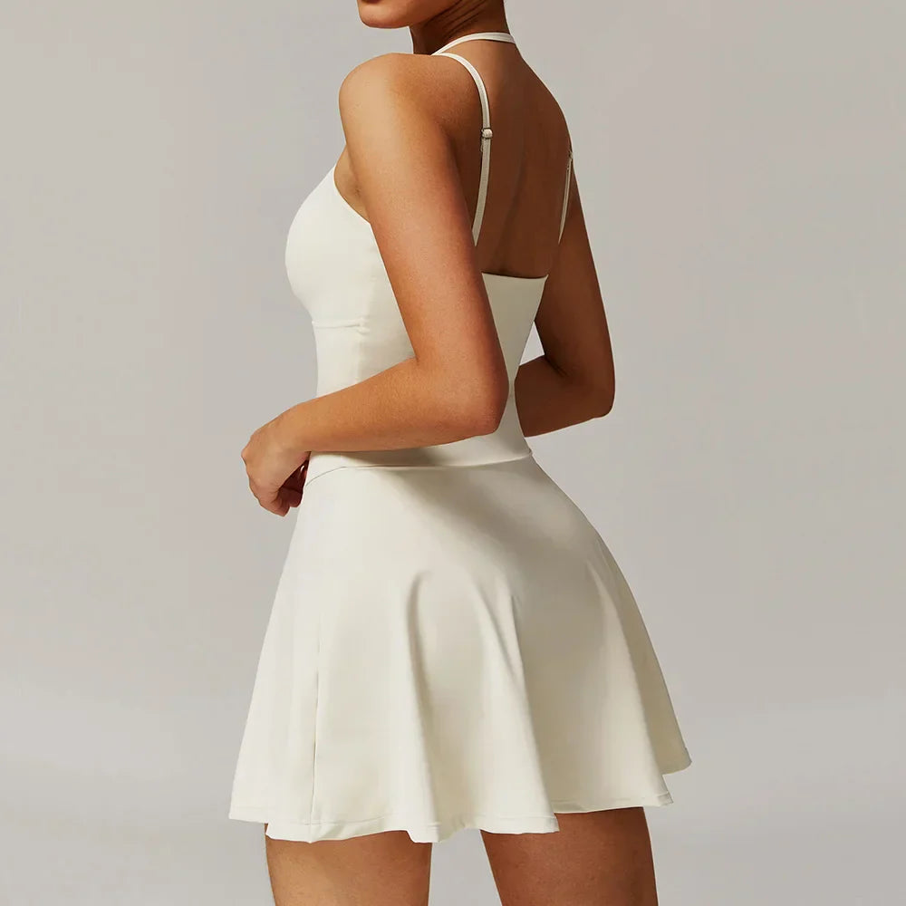 Cream off-white strappy mini dress with fitted bodice and flared skirt