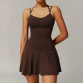 Off white strappy mini dress with fitted bodice and flared skirt