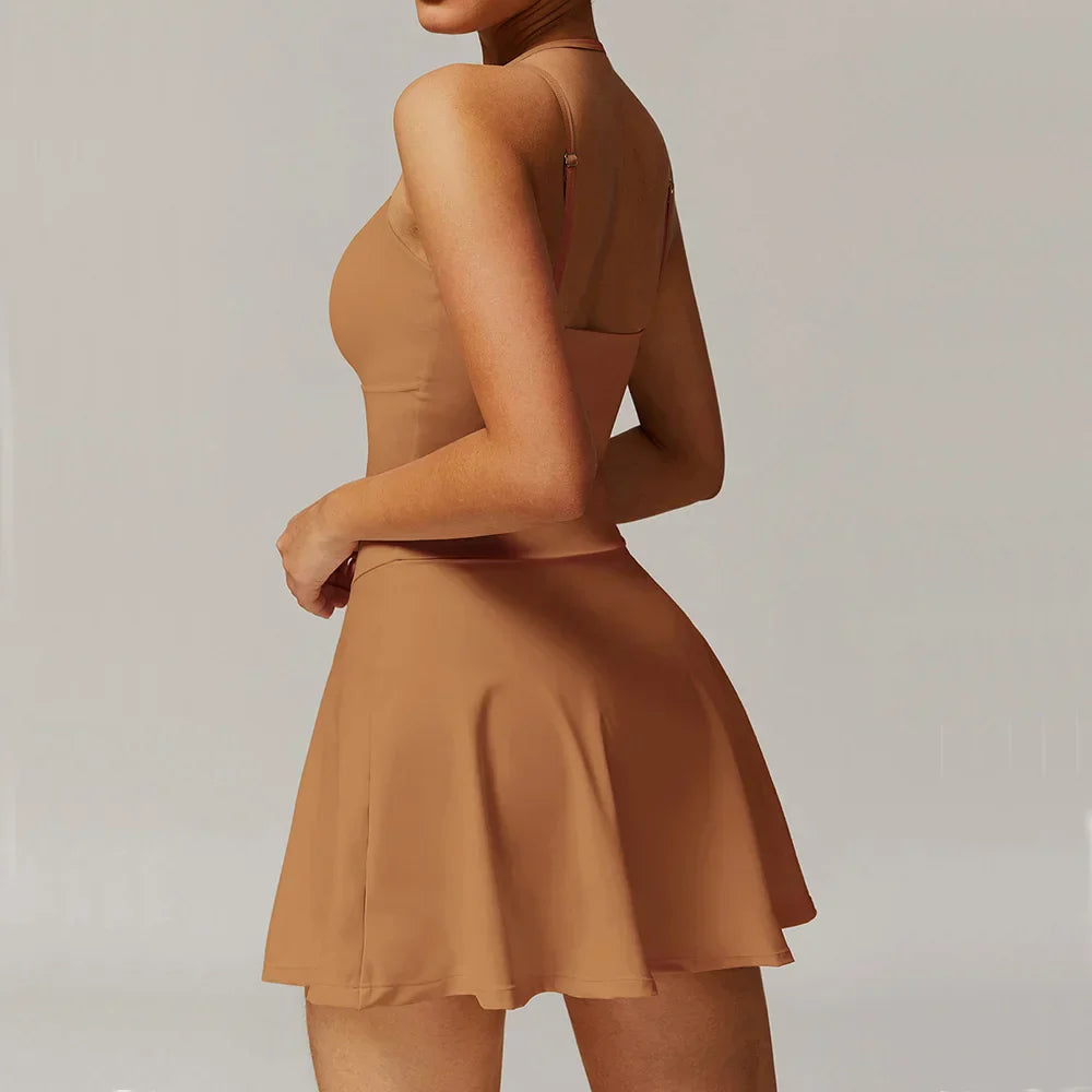 Woman in off white strappy mini dress with flared skirt