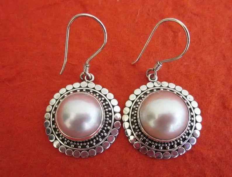 Retro Exaggerated Cat’s Eye French Buckle Earrings