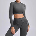 Dark gray seamless yoga long sleeve cropped top with matching leggings