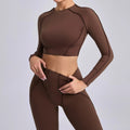 Seamless yoga long sleeve cropped top in light cream with leggings