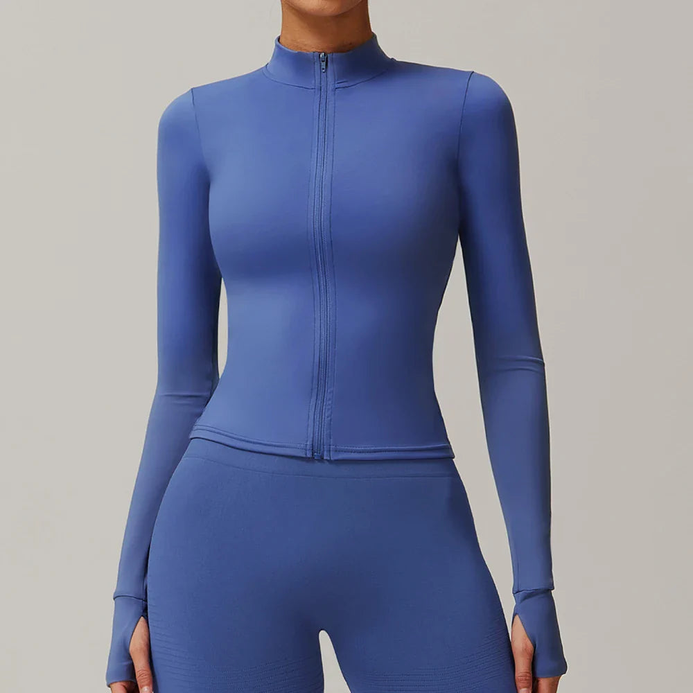 Blue full-zip athletic jacket and matching leggings, ideal for yoga long sleeve and long sleeve sports activities