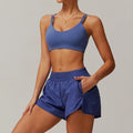 Woman modeling a periwinkle blue yoga suit 2pcs sports set for activewear fashion