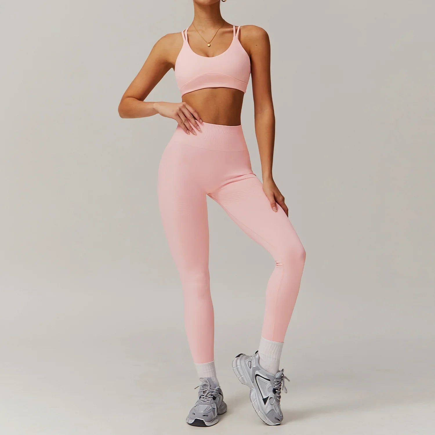 Light pink ribbed yoga suit 2pcs with sports bra and high-waisted leggings