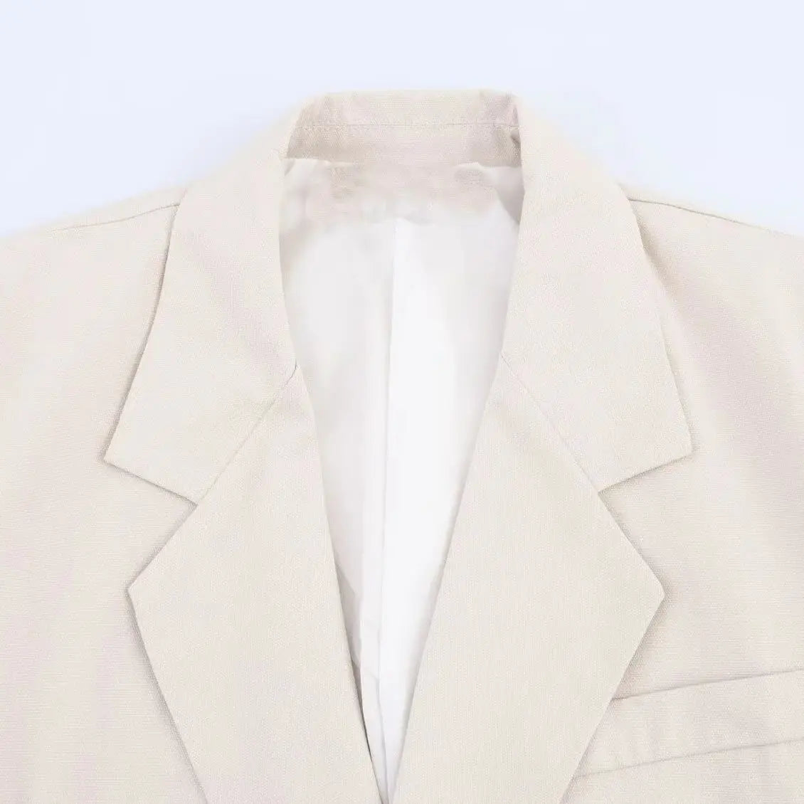 Women’s Loose Texture Blazer Lapel Long Sleeves Patch Pockets Hidden Button Slit Hem Jacket