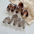 Women’s Wavy High Glossy Amber Brown Plastic Hair Clip